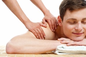 3403648-attractive-young-man-getting-spa-massage